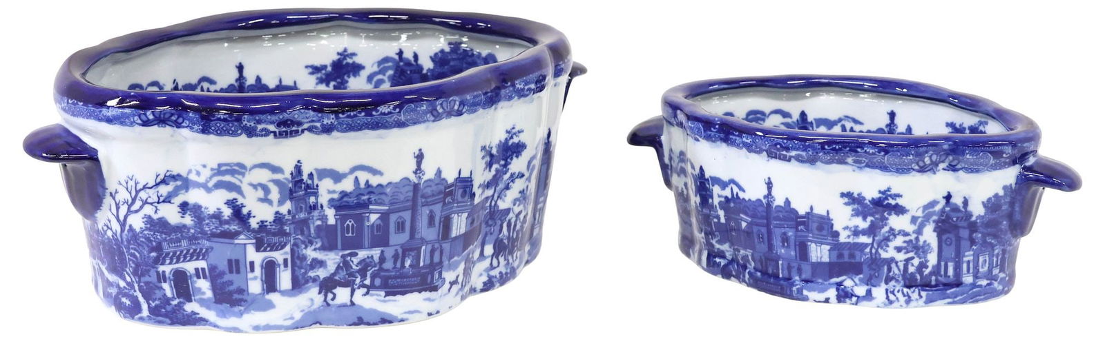 (2) BLUE & WHITE TRANSFERWARE STREET SCENE FOOTBATHS: (lot of 2) Decorative blue and white transferware footbaths/ planters, late 20th c., each with transfer street scene motifs, dual side handles, marked Victoria Ware underfoot, largest: approx 6"h,