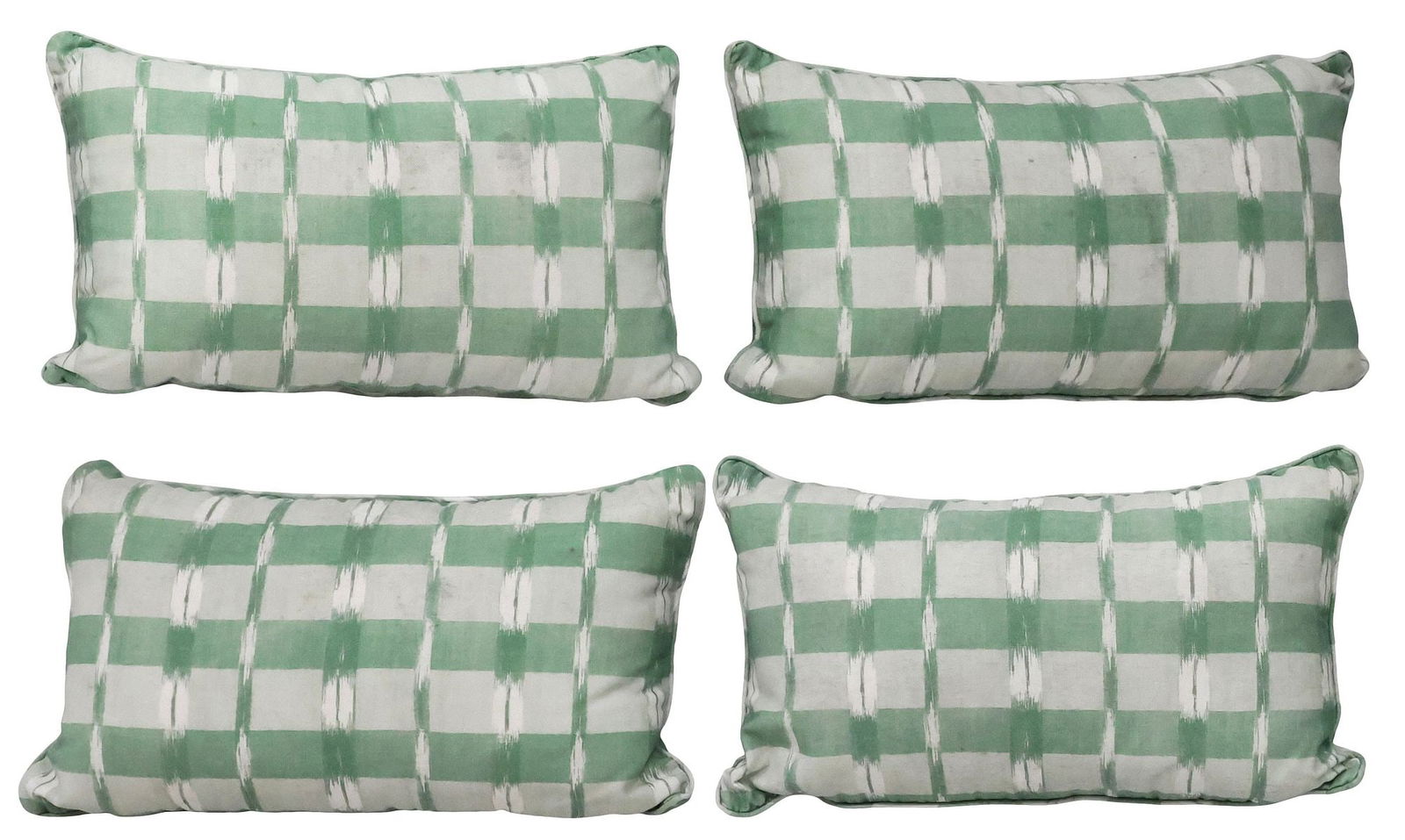 (4) CASA LOPEZ (ATTRIB.) UPHOLSTERED DOWN-FILLED THROW PILLOWS: (lot of 4) Down-filled throw pillows, in upholstery attributed to Casa Lopez, in the "Outdoor Ikat" pattern in green thyme, approx 26"l, 15"w, 8.5"d, 12lbs total **Provenance: the Stanley Family's