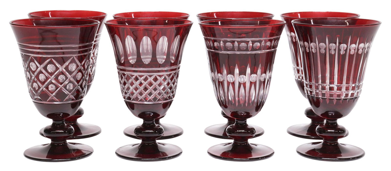 (8) WILLIAMS-SONOMA 'REGENCY GARNET' CUT GLASS WATER GOBLETS: (lot of 8) Williams-Sonoma red cut-to-clear glass water goblets, in the "Regency Garnet" pattern, each having dotted, striped, and crosshatched motifs, in four unique designs, with acid-etched