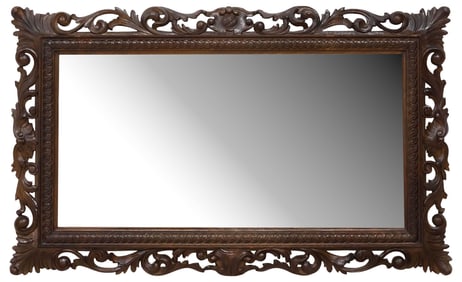 ITALIAN BAROQUE STYLE FOLIATE-CARVED WALNUT MIRROR