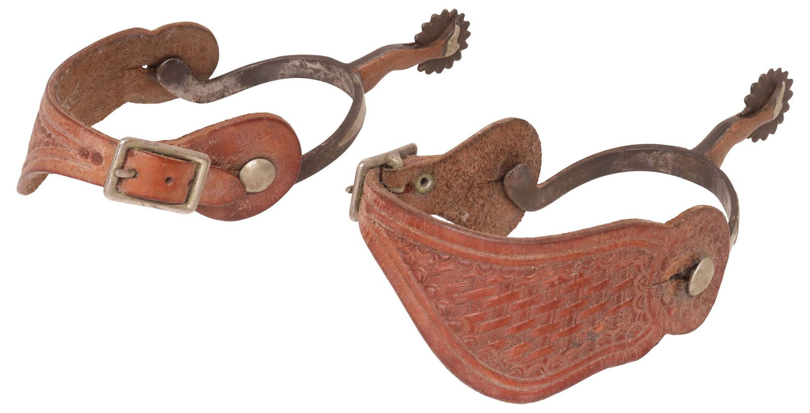 J.R. McCHESNEY DOUBLE MOUNTED GAL LEG SPURS, EARLY 20TH C.: (pair) J.R. McChesney double mounted Gal Leg spurs, 16 point rowels, tooled leather straps, inside yoke approx. 3.1/8"w, 2.75"d, for shipping approx. .80lbs