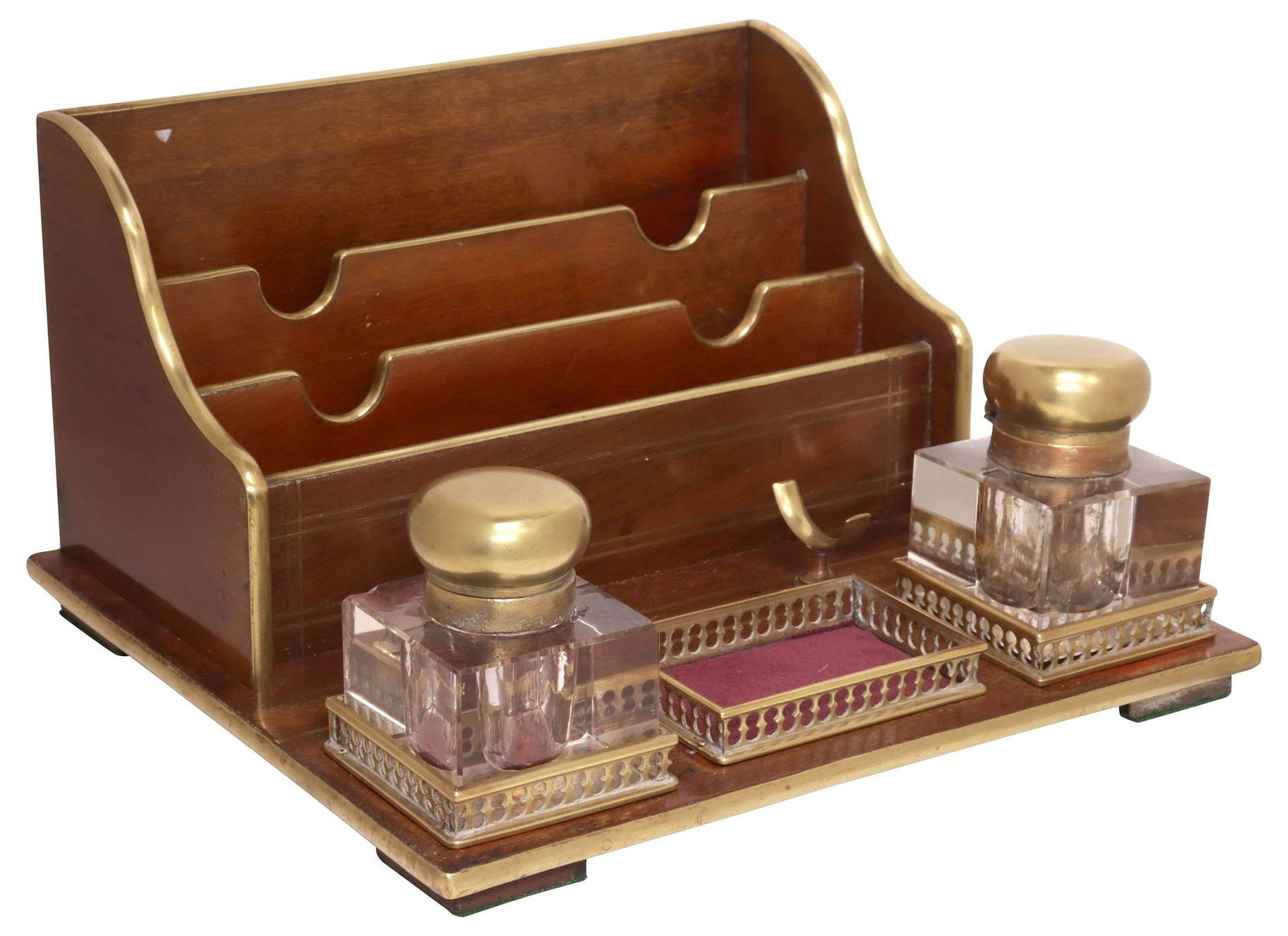 ENGLISH BRASS-MOUNTED DOUBLE-INKWELL DESK STAND WITH STATIONARY RACK: English brass-bound wood double-inkwell desk stand, early 20th c., rectangular stand fitted with letter rack, with brass trim, retaining two glass inkwells, each in compartment with pierced metal gall