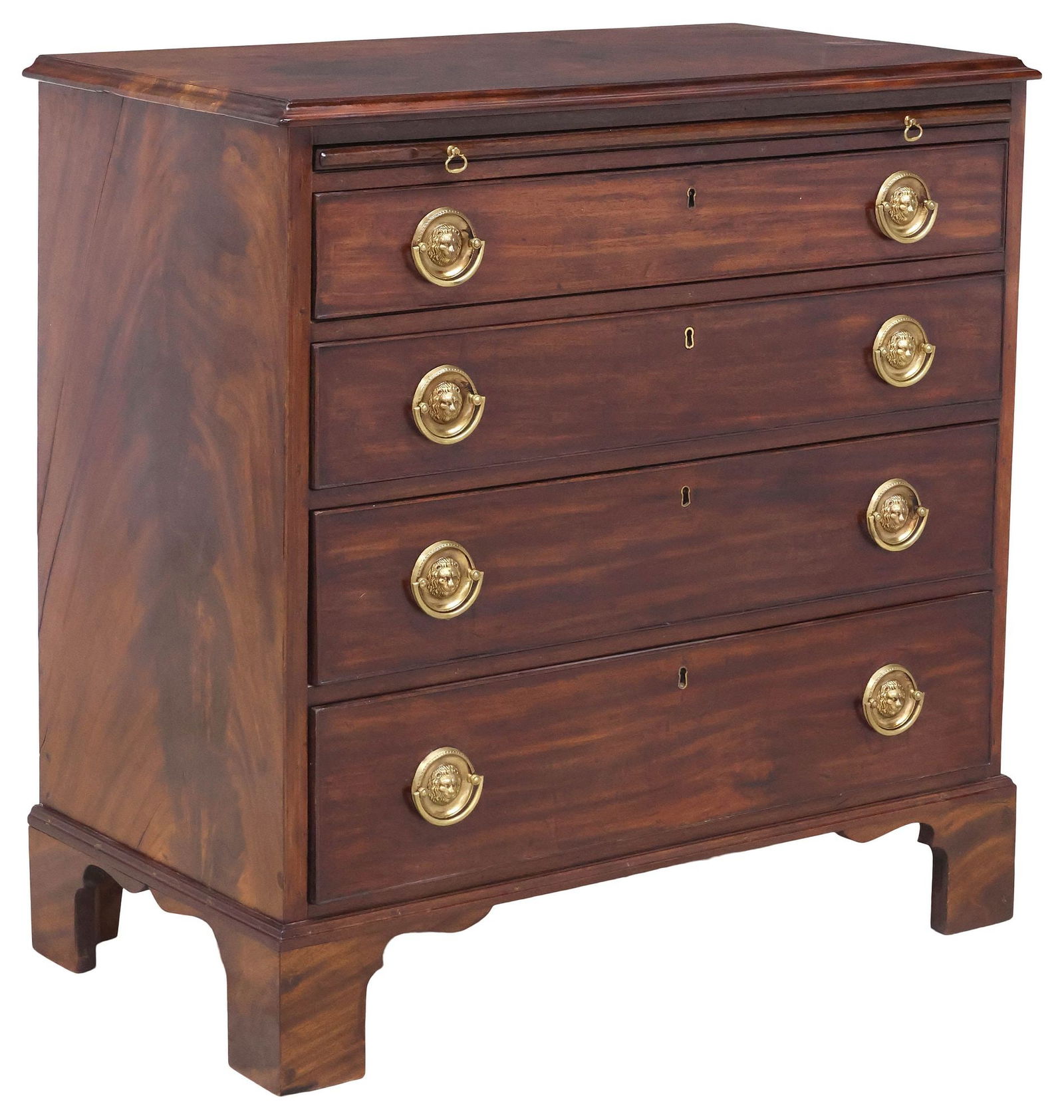 ENGLISH GEORGE III PERIOD MAHOGANY CHEST OF DRAWERS / BACHELOR'S CHEST: English Georgian period mahogany chest of drawers/ bachelor's chest, late 18th c., having brushing slide over four drawers, each with lion head gilt metal fittings, ending on bracket feet, approx 34"h