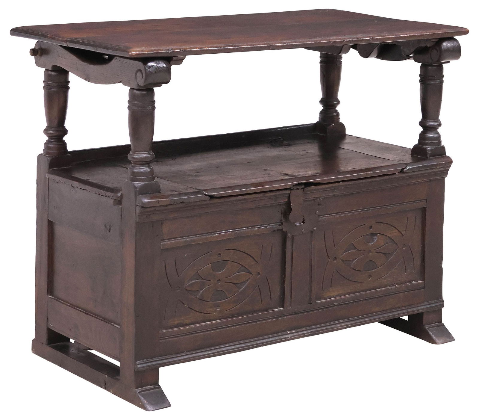 ENGLISH CARVED OAK METAMORPHIC MONK'S BENCH: English oak monastery bench, 19th c., having rectangular top with pin-release sliding action, converting into a seat back with incised scrollwork, hinged seat on iron strapping, revealing interior ope