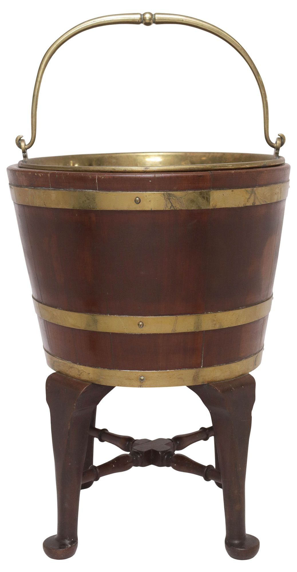 ENGLISH COOPERED PEAT BARREL ON STAND W/ REMOVABLE BUCKET LINER: English walnut brass-bound peat bucket on stand, late 19th c., with removable metal liner with swing handle, rising on four shaped legs, joined by possibly later X-form turned stretcher, approx 17