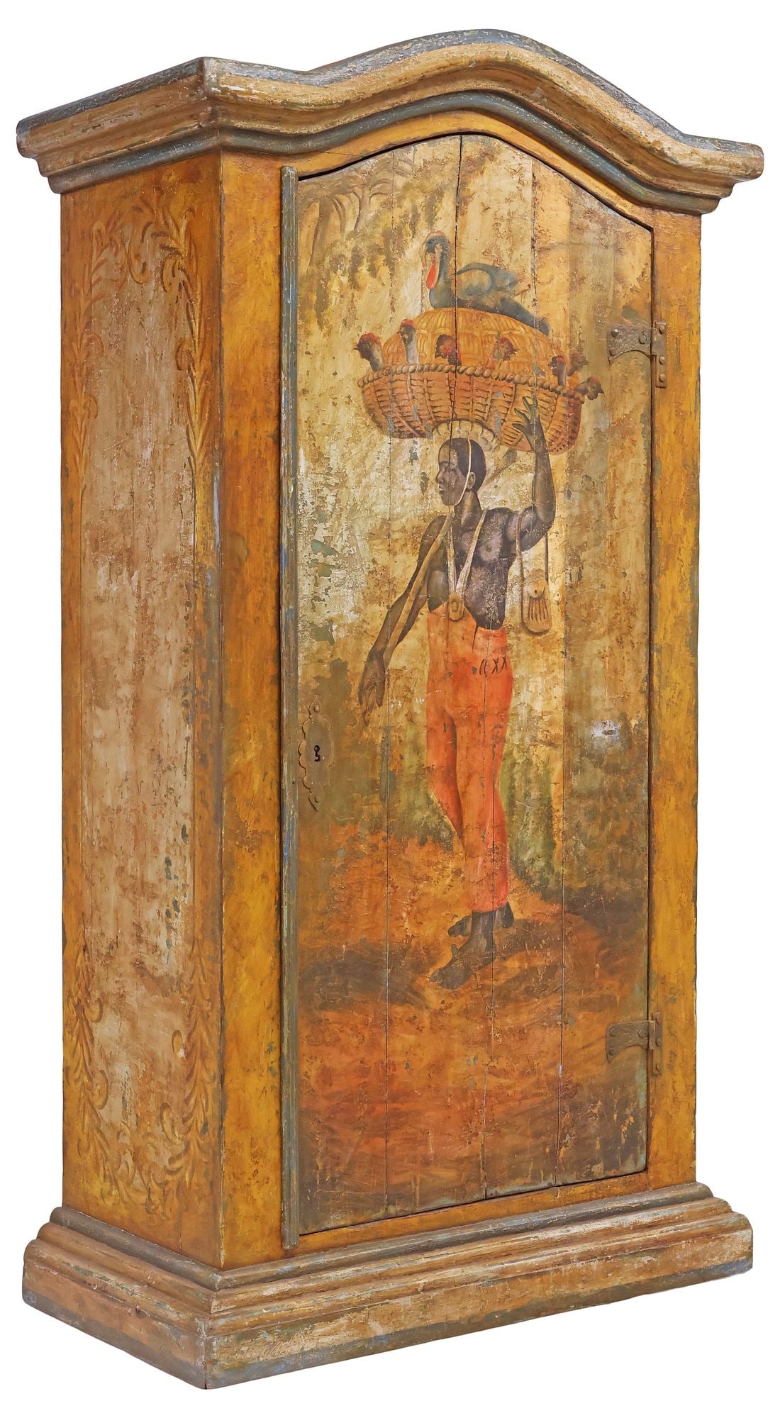 LARGE RUSTIC BRAZILIAN FIGURAL PAINT-DECORATED CABINET, 89"H: Rustic paint-decorated cabinet, Brazil, 20th c., having arched cornice top, single cabinet door, decorated with polychrome painted figure carrying a basket of birds in a verdant landscape, opening to