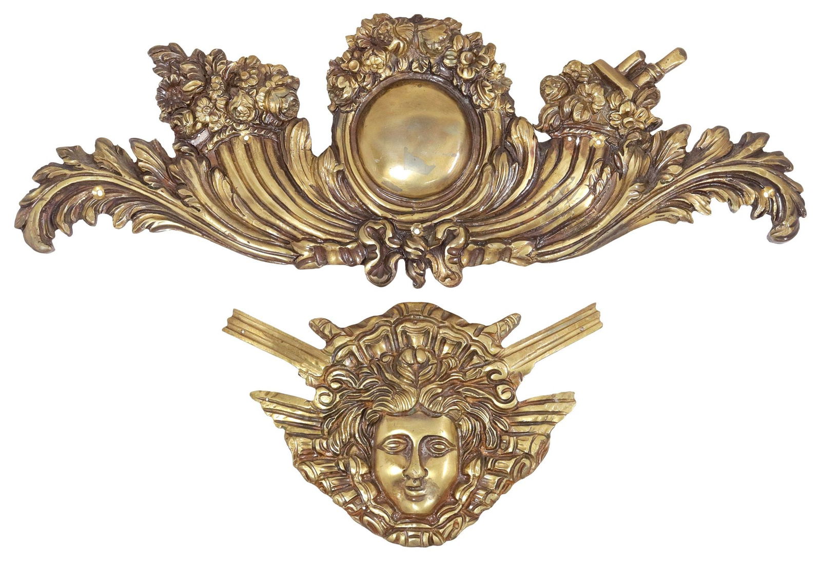 (2) LOUIS XVI STYLE BRASS FURNITURE ORNAMENTS: (lot of 2) French style brass furniture mounts, 20th c.: (1) foliate and florals, approx. 8"h, 22.25"w; (1) Medusa like face, approx. 7"h, 10.75"w, for shipping total of all approx. 15.60lbs