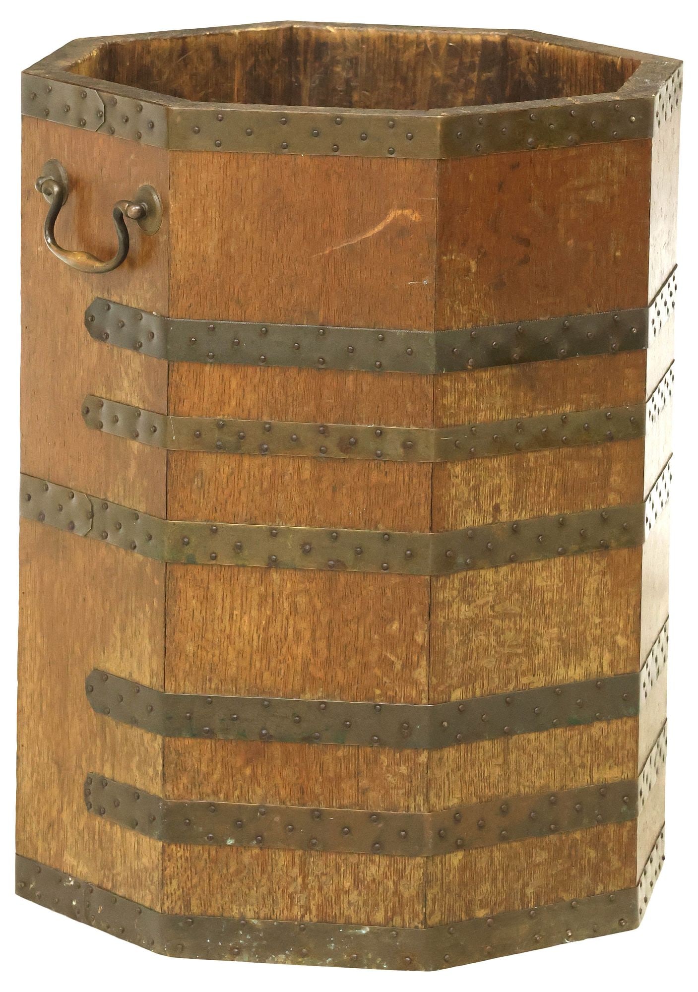 ENGLISH OAK OCTAGONAL BRASS-BOUND UMBRELLA / STICK STAND: English brass-bound oak stick stand of barrel form, late 19th c., having octagonal paneled body with two handles, secured by brass bands, approx 18.5"h, 15"w, 14"d