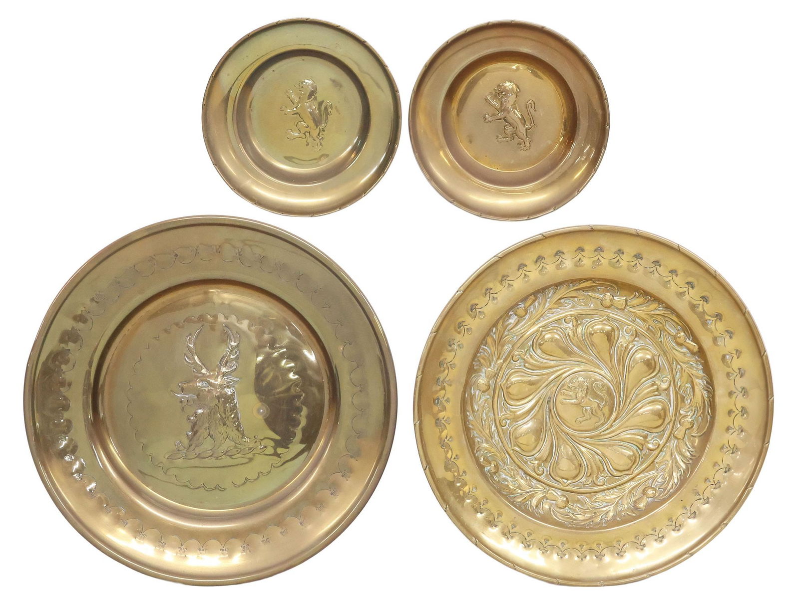 (4) CONTINENTAL REPOUSSE BRASS ALMS DISHES, HERALDIC LIONS & STAG (1 of 2)