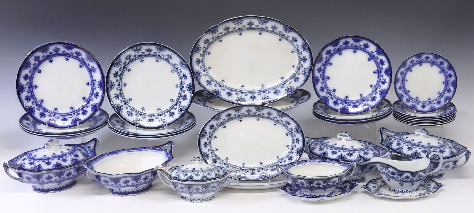 (33) ENGLISH FORD & SONS 'DUDLEY' FLOW BLUE DINNER SERVICE: (lot of 33) English blue and white dinner service, Ford & Sons, in the "Dudley" pattern, with parcel-gilt remnants, most marked underfoot, set with some color variation, including: (8) dinner pates, a