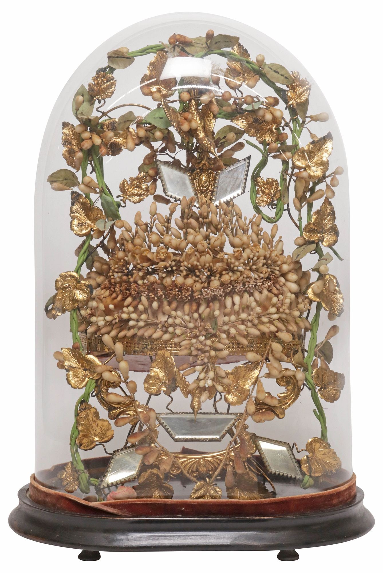 FRENCH GLOBE DE MARIEE / BRIDE'S GLOBE IN CLOCHE: French globe de mariee/ bride's globe, late 19th c., glass cloche/ dome on ebonized base, encasing gilt metal and faux foliates, atop tufted cushion, approx 20"h, 13"w, 9"d, 7.5lbs