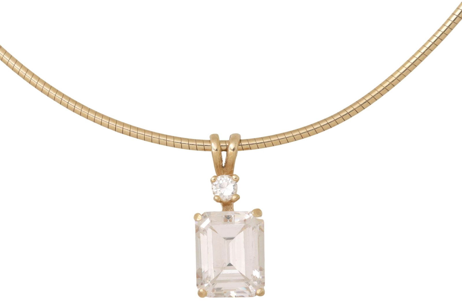 ESTATE 14KT YELLOW GOLD & SIMULANT DIAMOND PENDANT NECKLACE: Estate Italian 14kt yellow gold pendant necklace, having emerald-cut simulant diamond pendant with small circular white stone, on snake chain with lobster claw clasp, pendant hallmarked 14K, clasp