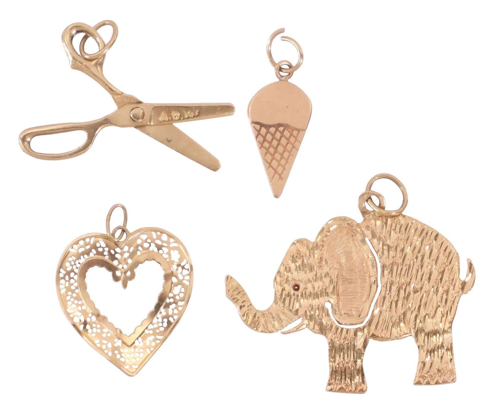 (4) ESTATE 14KT GOLD CHARMS, ARTICULATED SCISSORS, HEART, ELEPHANT & ICE CREAM CONE: (lot of 4) Estate 14kt yellow gold charms, including an elephant, articulated scissors, ice cream cone, and a heart, three stamped 14K, the heart testing as 14kt, denting to heart, largest: 1"h, 1.25"