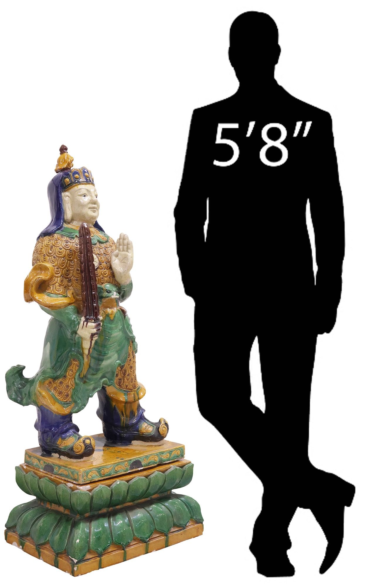 LARGE CHINESE SANCAI-GLAZED POTTERY FIGURE, MING STYLE WARRIOR, 53.5"H: Large Chinese glazed pottery figure, modeled as a Ming Dynasty style warrior holding a spear, in a Sancai palette, on double lotus platform base, typical small chips throughout, figure: approx