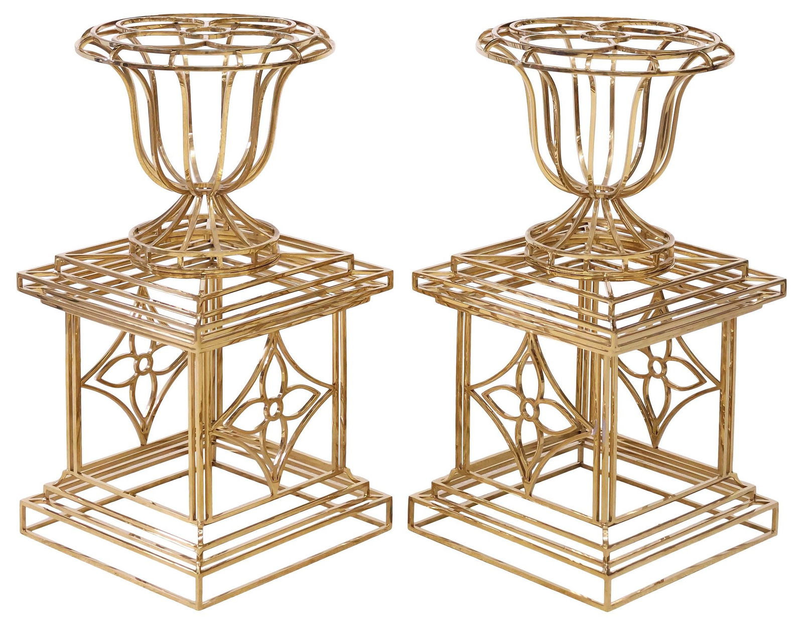 (2) HOLLYWOOD REGENCY GILT-BRASS PEDESTAL BOTTLE RACKS / DISPLAY STANDS: (pair) Hollywood Regency style gilt-brass bottle racks/ display stands, 20th c., each basin modeled as an openwork campana-form urn, top fitted with four rings, possibly a bottle rack, raised on squar