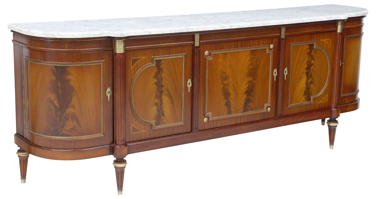 FRENCH LOUIS XVI STYLE MARBLE-TOP FLAME MAHOGANY SIDEBOARD: French Louis XVI style flame mahogany sideboard, 20th c., having shaped marble top, over four paneled doors with gilt-metal trim, each curved outer door opening to reveal two fixed-height shelves, one