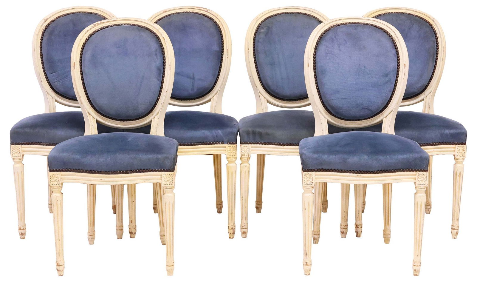 (6) FRENCH LOUIS XVI STYLE PAINT-DECORATED DINING CHAIRS: (lot of 6) French Louis XVI style paint-decorated side chairs, 20th c., each having oval medallion back and padded seat in a blue fabric upholstery, frame in a white-painted finish, rising on