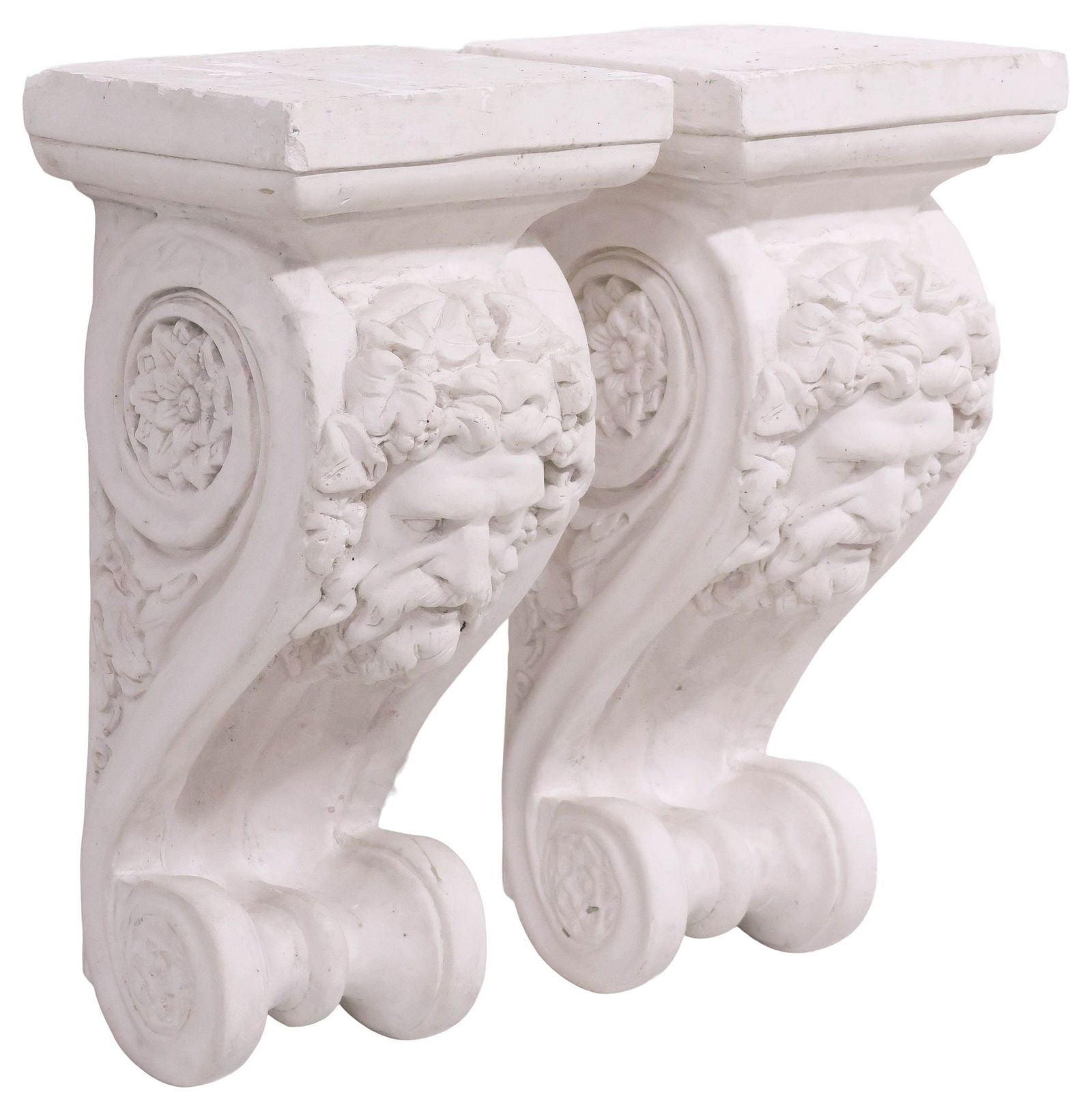(2) NEOCLASSICAL STYLE ARCHITECTURAL PLASTER CORBELS / WALL BRACKETS: (pair) Neoclassical style architectural cast plaster wall brackets/ corbels, 20th c., each having stepped capital, over figural mask, ending on foliate scrolls, approx 23"h, 10.5"w, 10.25"d, 80.75lbs