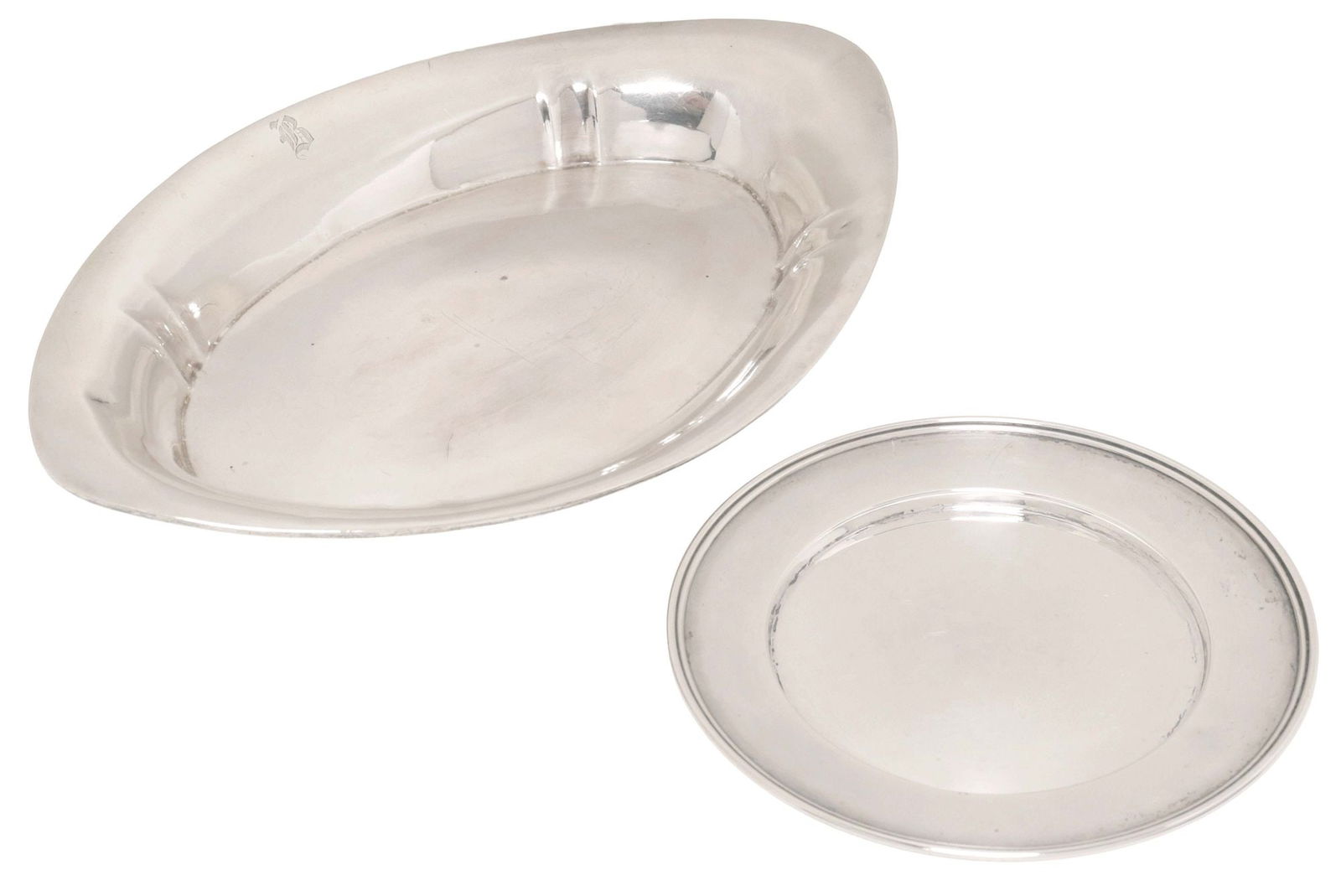 (2) STERLING SILVER TABLE ARTICLES, ALVIN SERVICE DISH & BREAD PLATE: (lot of 2) Sterling silver serviceware, including: (1) Alvin Manufacturing Company, almond-shaped service dish, rim monogrammed B, maker's mark underfoot, M64, approx 11.25"l, 7 1/8"w; (1) bread plate