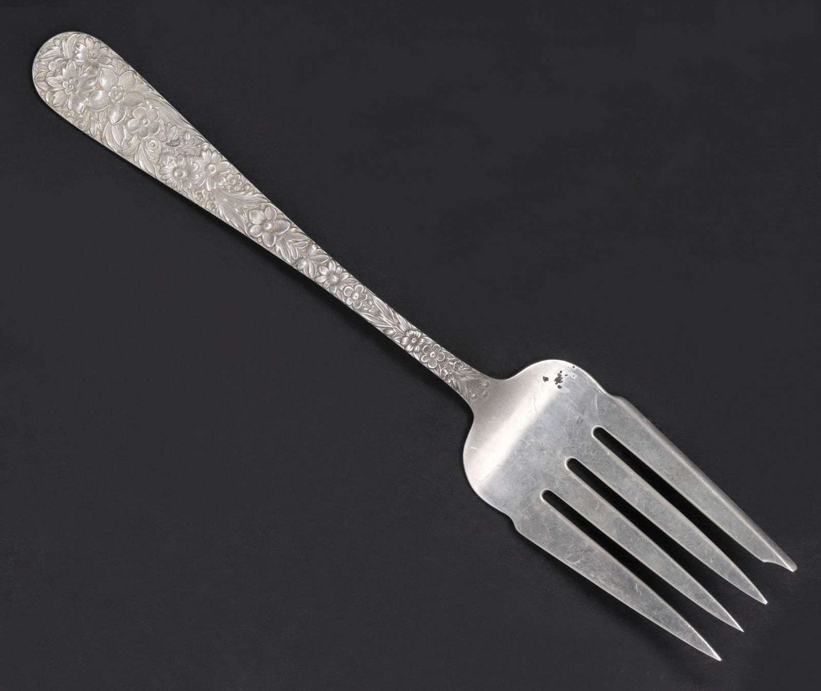 S. KIRK & SON 'REPOUSSE' PATTERN STERLING MEAT SERVICE FORK: American sterling silver solid cold meat serving fork, S. Kirk and Son, in the "Repousse" pattern, no observed monograms, approx 8.5"l, 2.86ozt