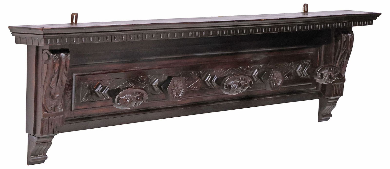 ITALIAN RENAISSANCE REVIVAL CARVED WALNUT WALL-MOUNTED COAT / HAT RACK: Italian Renaissance Revival carved walnut wall-mounted coat/ hat rack, early 20th c., having molded cornice, over five turned hooks, flanked by acanthus motifs, approx 17"h, 63"w, 7.5"d