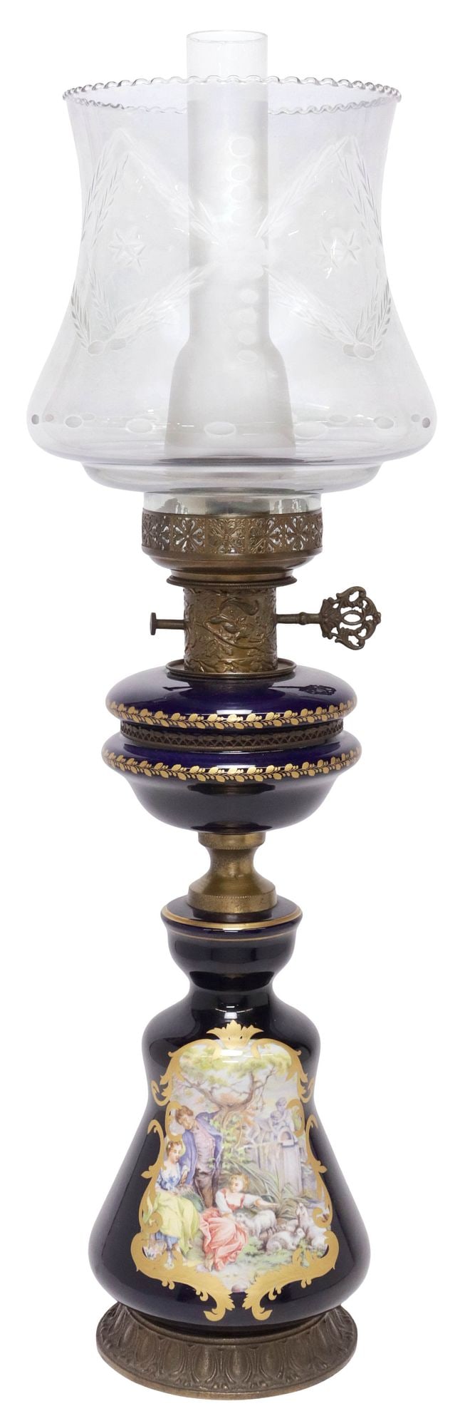 FRENCH SEVRES STYLE COBALT PORCELAIN ELECTRIFIED OIL LAMP: French Sevres-style porcelain oil lamp, late 19th c., now electrified, having scalloped globe, encasing glass chimney, vasiform body with transferred pastoral scene on cobalt ground, rising on round