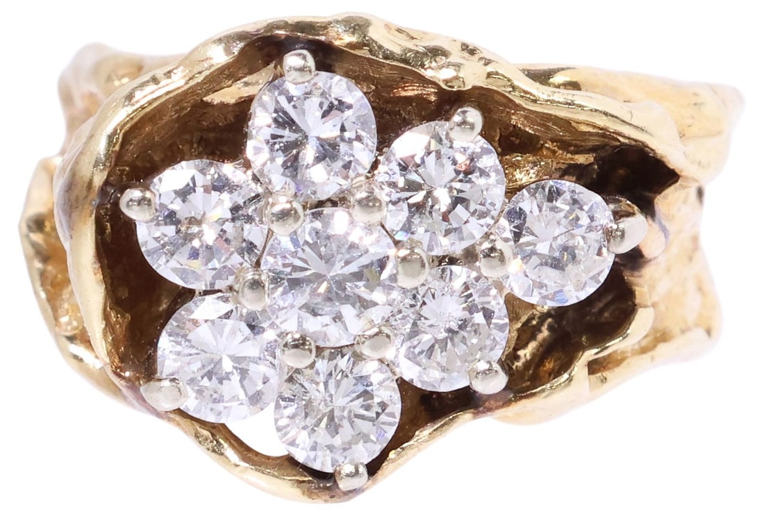 ESTATE 14KT YELLOW GOLD & 1.36CTTW DIAMOND FLOWER RING: Estate 14kt yellow gold (tested) and diamond ring, having (eight) large round-cut diamonds, approx 1.36cttw, average color: H-I, average clarity: SI, forming floral arrangement, in naturalistic freefo
