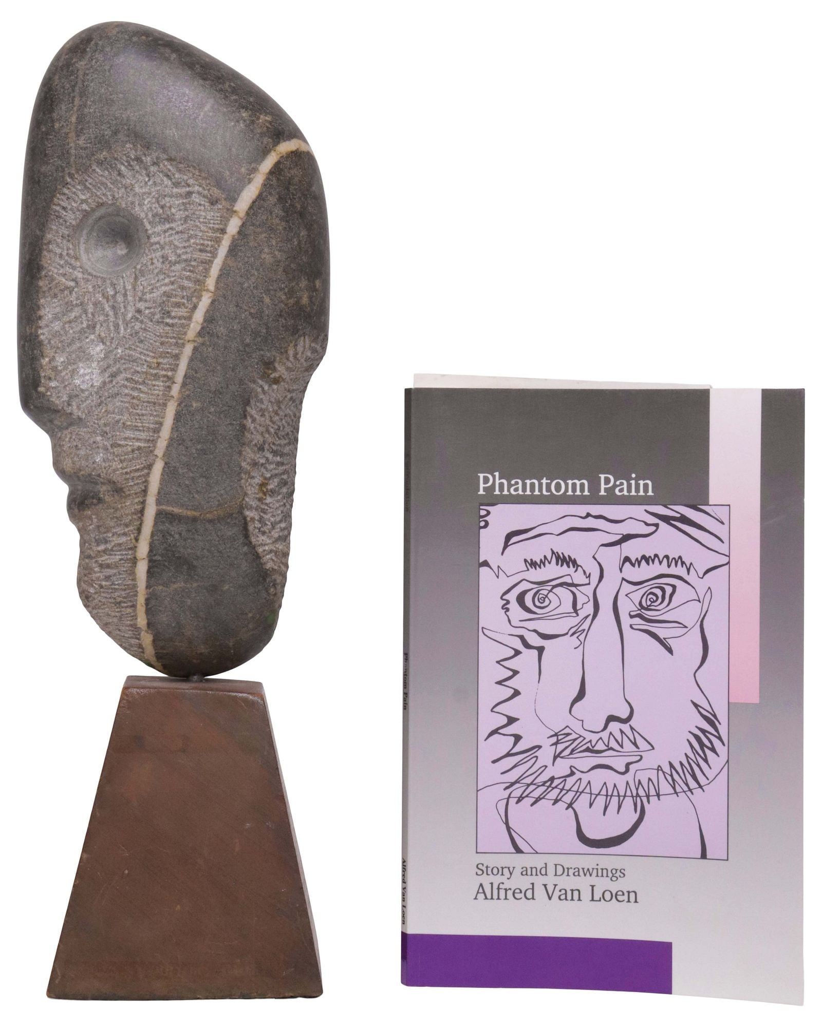 ALFRED VAN LOEN (1924-1994) CARVED STONE FIGURAL HEAD SCULPTURE & BOOK: (lot of 2) Carved stone sculpture, The Warrior, attributed to Alfred Van Loen (German, 1924-1994), apparently unsigned, rising on tapering wood plinth, overall: approx 14.5"h, 4.5"w, 3.5"d;