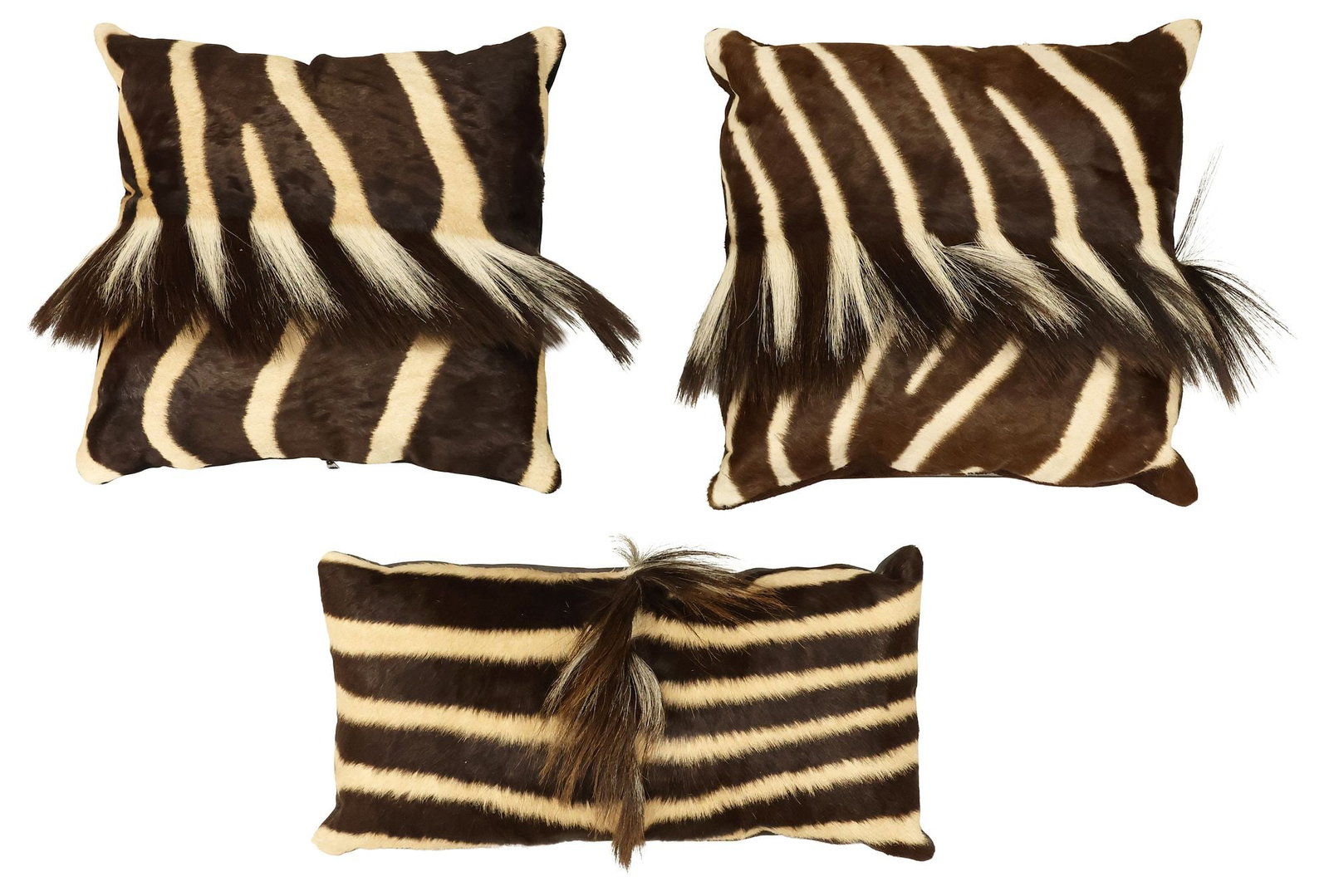 (3) CUSTOM ZEBRA HIDE / MANE & SUEDE THROW PILLOWS: (lot of 3) Custom throw pillows, in zebra hide/ mane, each with suede/leather back, one tagged Made in South Africa, largest: approx 15.5"h, 15.5"w, 6.5"d, 8.5lbs total **Provenance: Treasures from