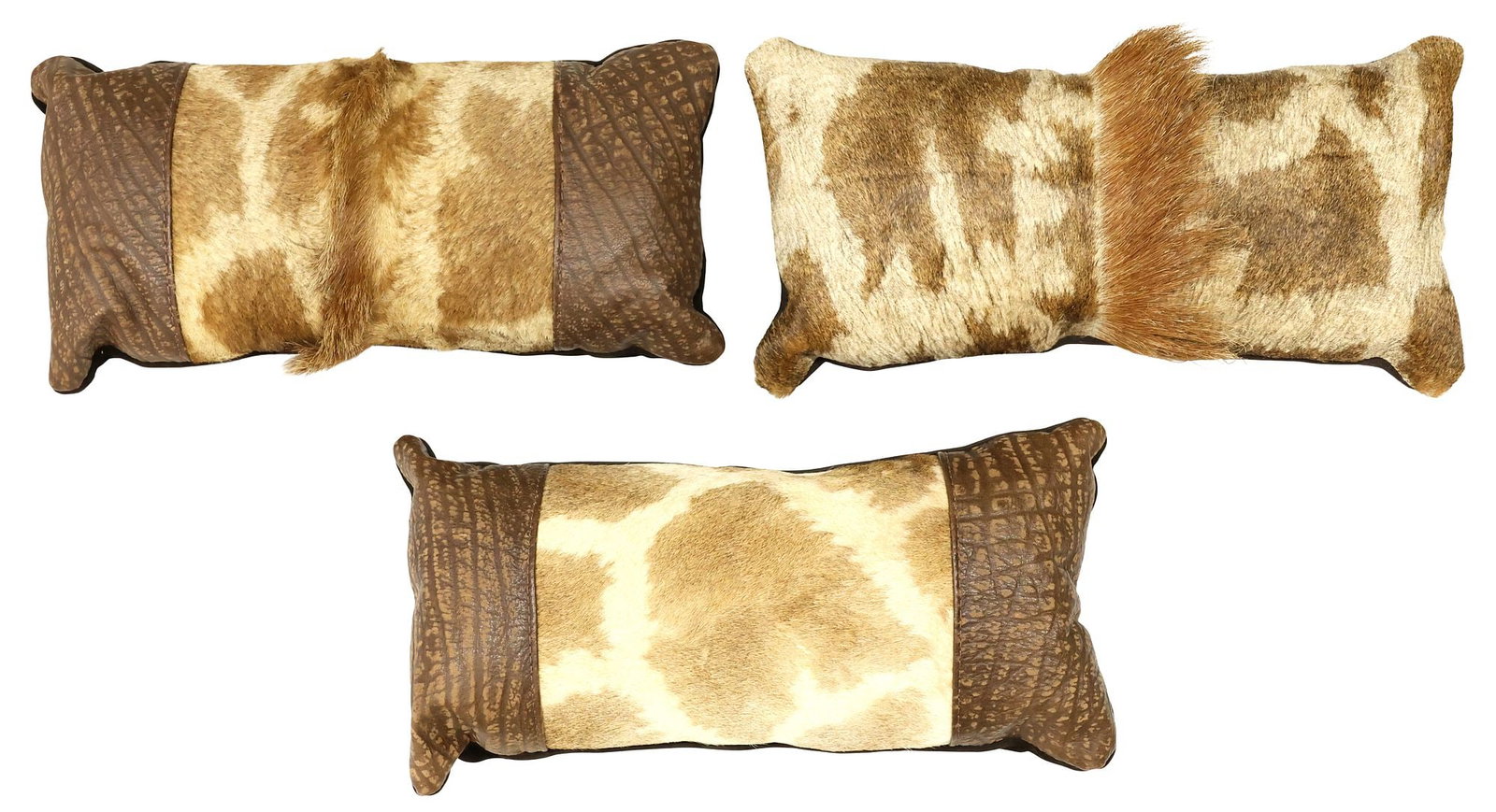 (3) CUSTOM GIRAFFE HIDE / MANE & SUEDE THROW PILLOWS: (lot of 3) Custom throw pillows, in giraffe hide/ mane and (2) with patterned leather ends, all with suede backing, largest: approx 10.5"h, 20"w, 6.5"d, 6.75lbs total **Provenance: Treasures from the