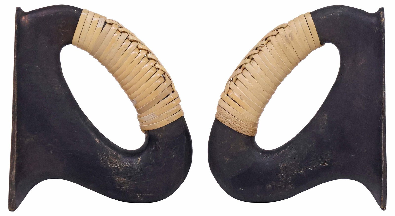 (2) CARL AUBOCK II (1900-1957) SCULPTURAL BRASS BOOKENDS, MODEL 3530: (pair) Modernist patinated brass sculptural bookends, designed by Carl Aubock II (Austrian, 1900-1957) for Werkstatte Carl Aubock, model 3530, each of looped curvilinear form, with woven cane handle,