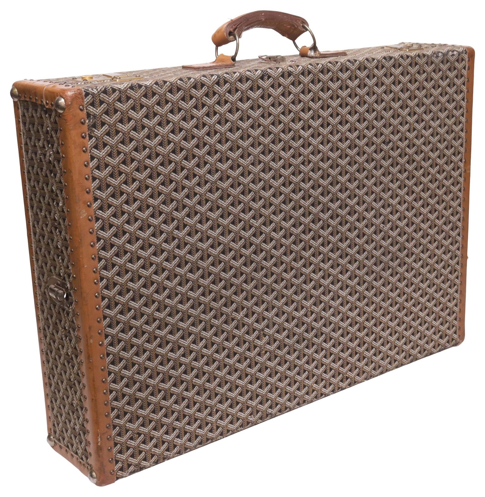 VINTAGE GOYARD HARDSIDED GOYARDINE CANVAS TRAVEL SUITCASE: Vintage Goyard hardsided travel suitcase, in black Goyardine canvas, with studded tan leather trim, gold-tone metal hardware, rolled top handle, satin-lined interior with dual luggage straps, maker