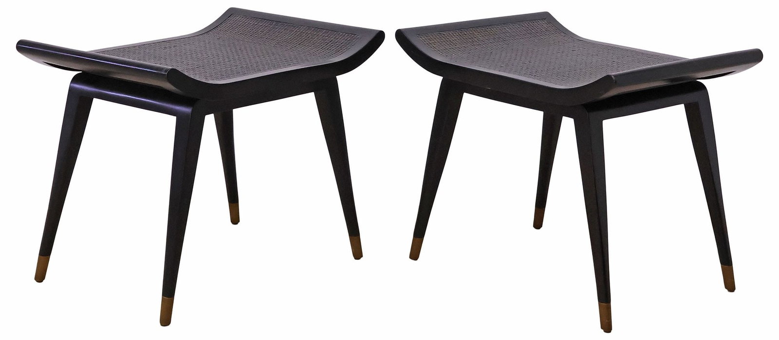 (2) PALECEK 'HEATH' WOVEN RATTAN-SEAT EBONIZED LOW STOOLS: (pair) Contemporary ebonized wood "Heath" stools, Palecek, Richmond, California, 21st c., woven rattan seat with gently upturned end, tapered legs ending on metal feet, retaining maker label