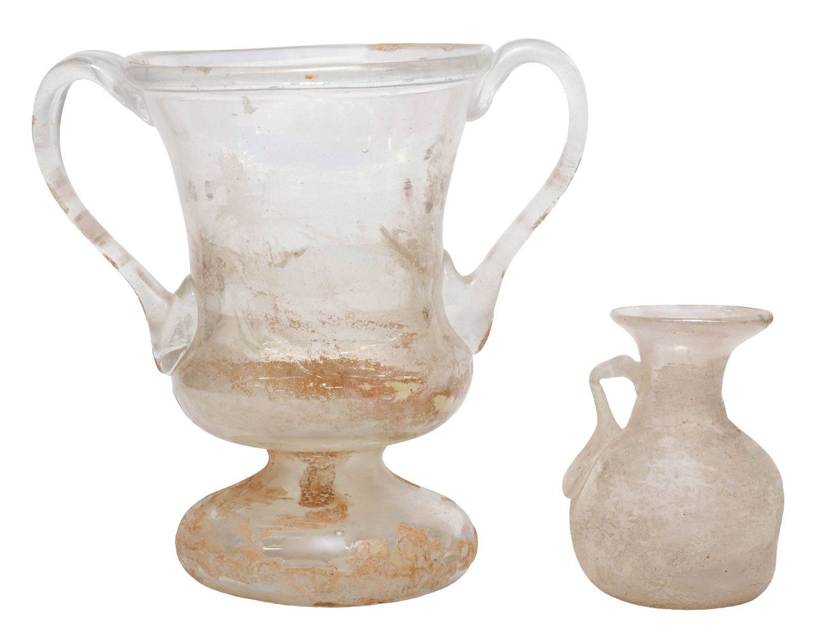 (2) ROMAN STYLE IRIDESCENT GLASS TABLE ITEMS, AMPHORA & EWER: (lot of 2) Roman style iridescent glass vessels, including: (1) amphora, dual handles, fracture at handle join, approx 7"h, 7"w, 4.75"d; (1) small handled ewer, approx 3.5"h, 2.75"diam; 2.5lbs total