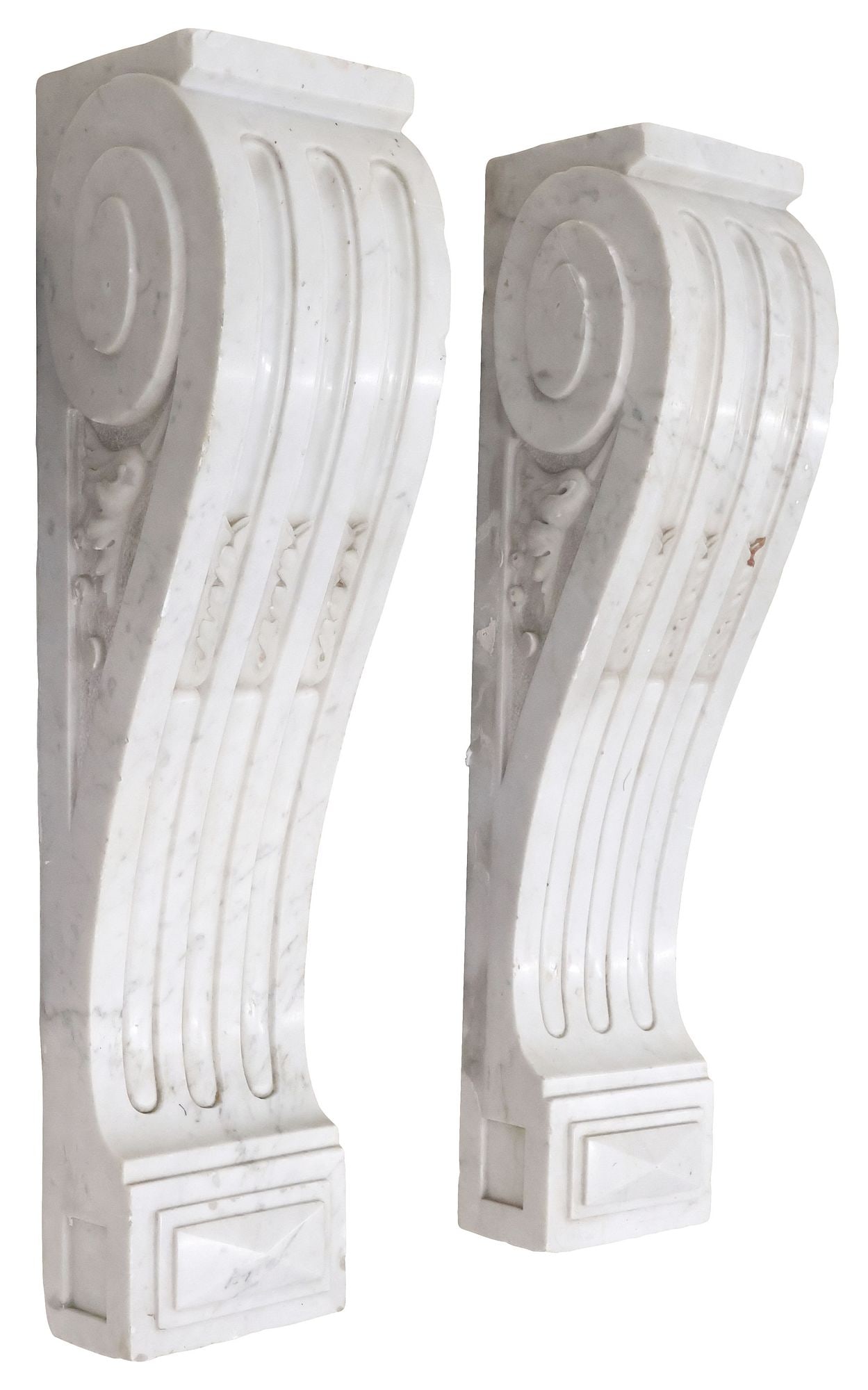 (2) LOUIS XVI STYLE CARVED MARBLE ARCHITECTURAL CORBELS: Louis XVI style marble architectural corbels, 19th c., scrolled form with central fluting, foliate motifs at sides, approx 28.25"h, 7"w, 7.5"d **Provenance: Dallas, Texas: When the madness of collecti