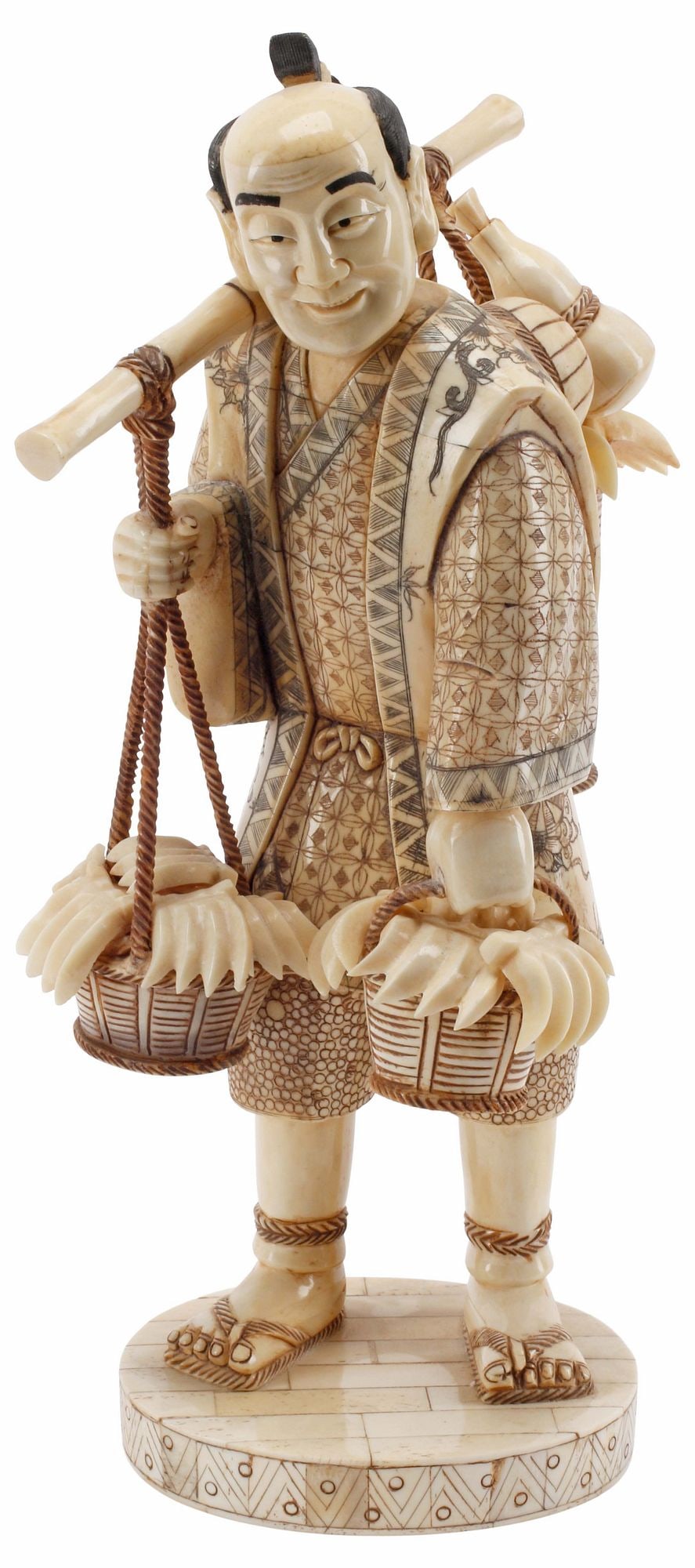 LARGE JAPANESE BONE TILED FIGURE, BANANA SELLER, 12.5"H: Japanese bone-tiled figure, modeled as a street vendor carrying baskets of bananas from a shoulder pole, heightened with ink, standing on a circular base, mark underfoot, approx 12.5"h,