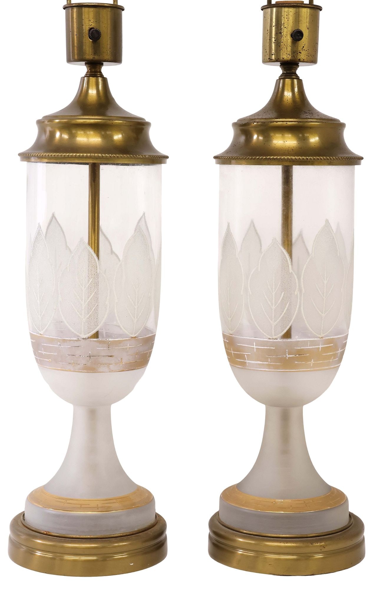 (2) LARGE AMERICAN PARCEL-GILT URN FORM TABLE LAMPS: (pair) Large American glass table lamps, 20th c., each of urn form, with single light, colorless and satin glass body, centering a band of stiff leaves above linear ground, pedestal foot on metal base