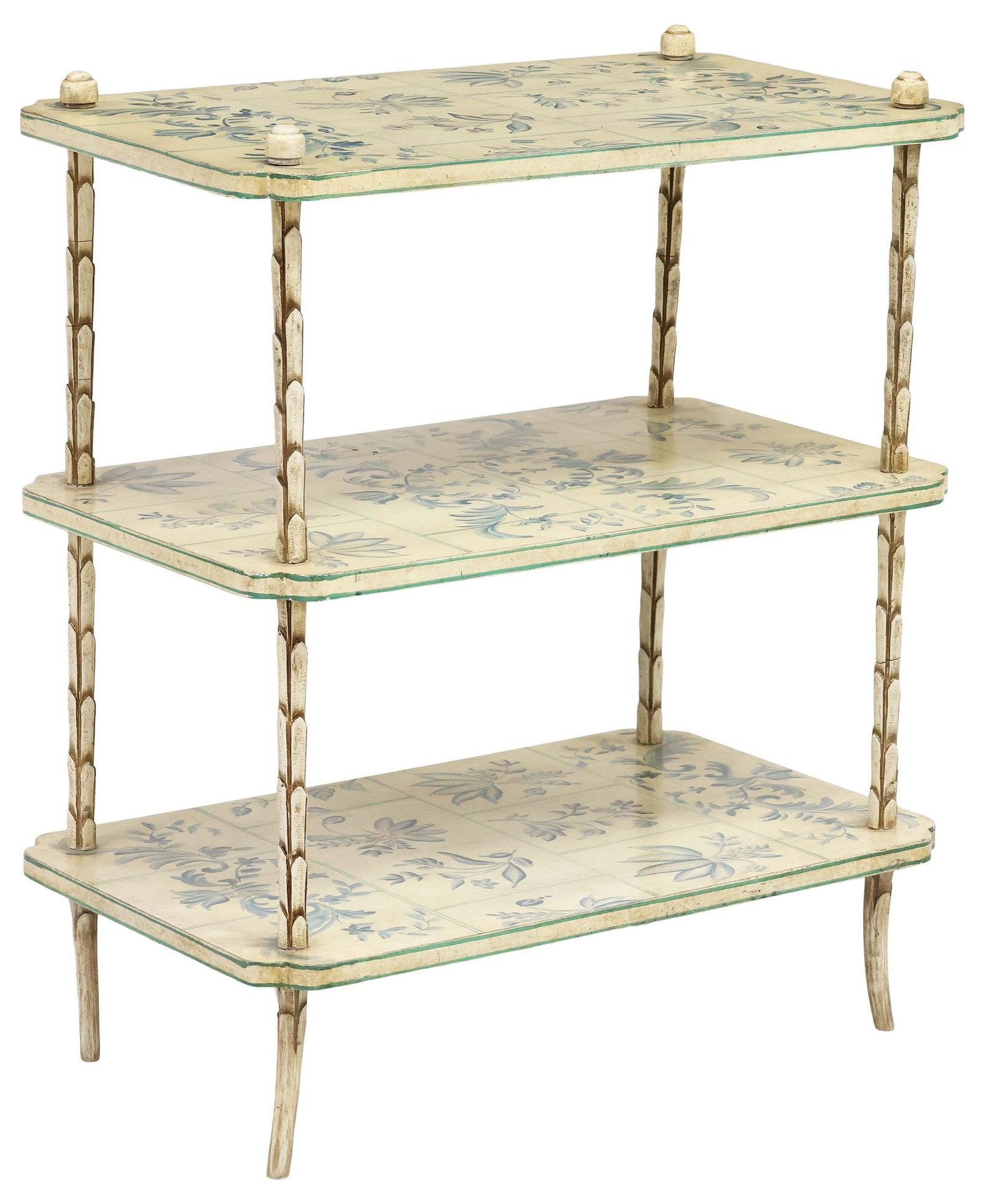PAINT DECORATED & FOLIATE CARVED 3-TIER ETAGERE / SIDE TABLE: Paint-decorated side table / etagere, 20th c., having three shaped tiers, each hand-painted with blue floral sprays, in a faux tile pattern, rising on foliate carved supports, ending on subtly