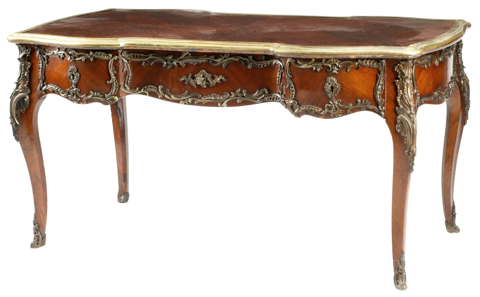 FRENCH LOUIS XV STYLE ORMOLU-MOUNTED MATCHED VENEER WRITING DESK: French Louis XV style bureau plat/ writing desk, 19th c., with bronze dore mounts, shaped top finished in bookmatched veneers, above three drawers, rising on cabriole legs, ending on sabots, approx 30