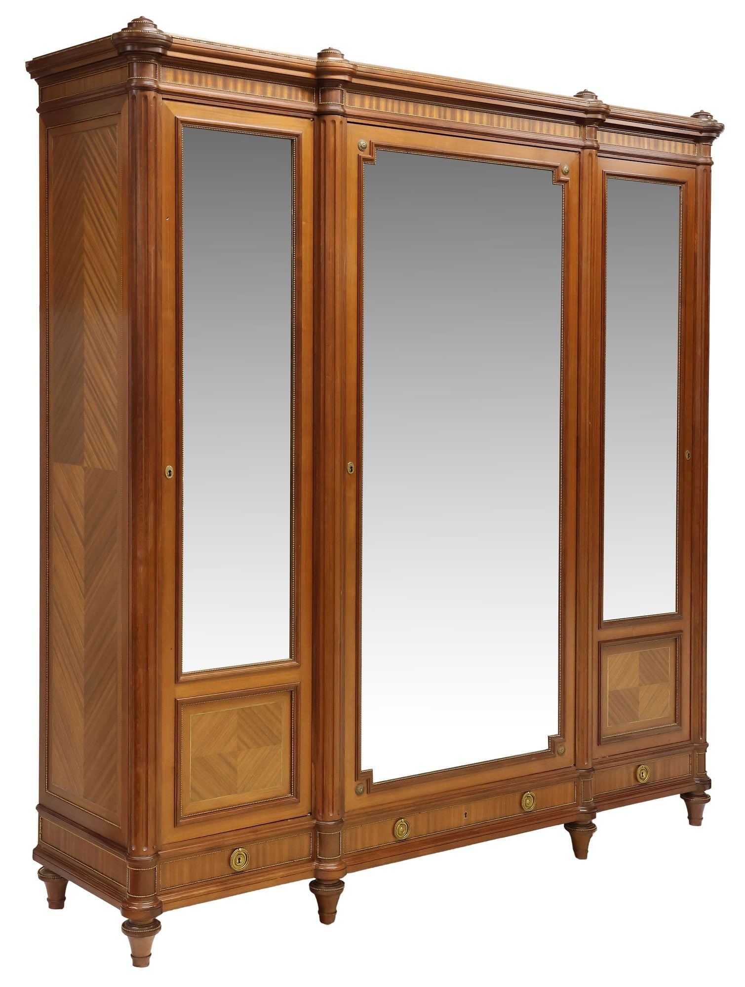FRENCH LOUIS XVI STYLE MIRRORED MAHOGANY BREAKFRONT ARMOIRE: French Louis XVI style mahogany armoire, early 20th c., three cabinet doors faced with beveled mirror plate, lower matched veneer paneling and gilt-metal beaded trim, central door with fixed-height sh