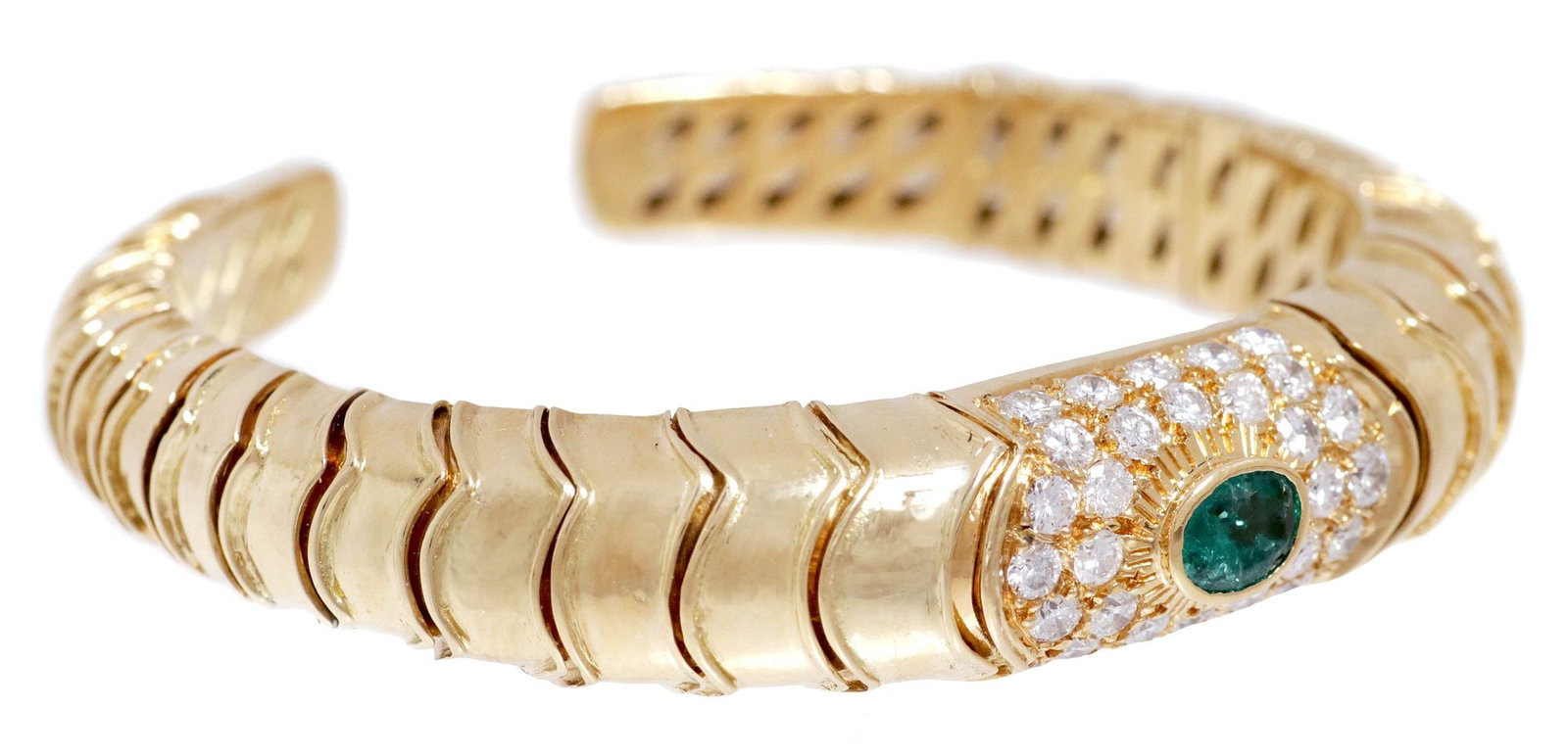 ESTATE 18KT YELLOW GOLD, EMERALD & DIAMOND BRACELET: Estate 18kt yellow gold cuff bracelet, slightly flexible links set with an approx 1.00ct emerald, in a surround of thirty-two small round diamonds, approx 2.00cttw, near colorless, average clarity: