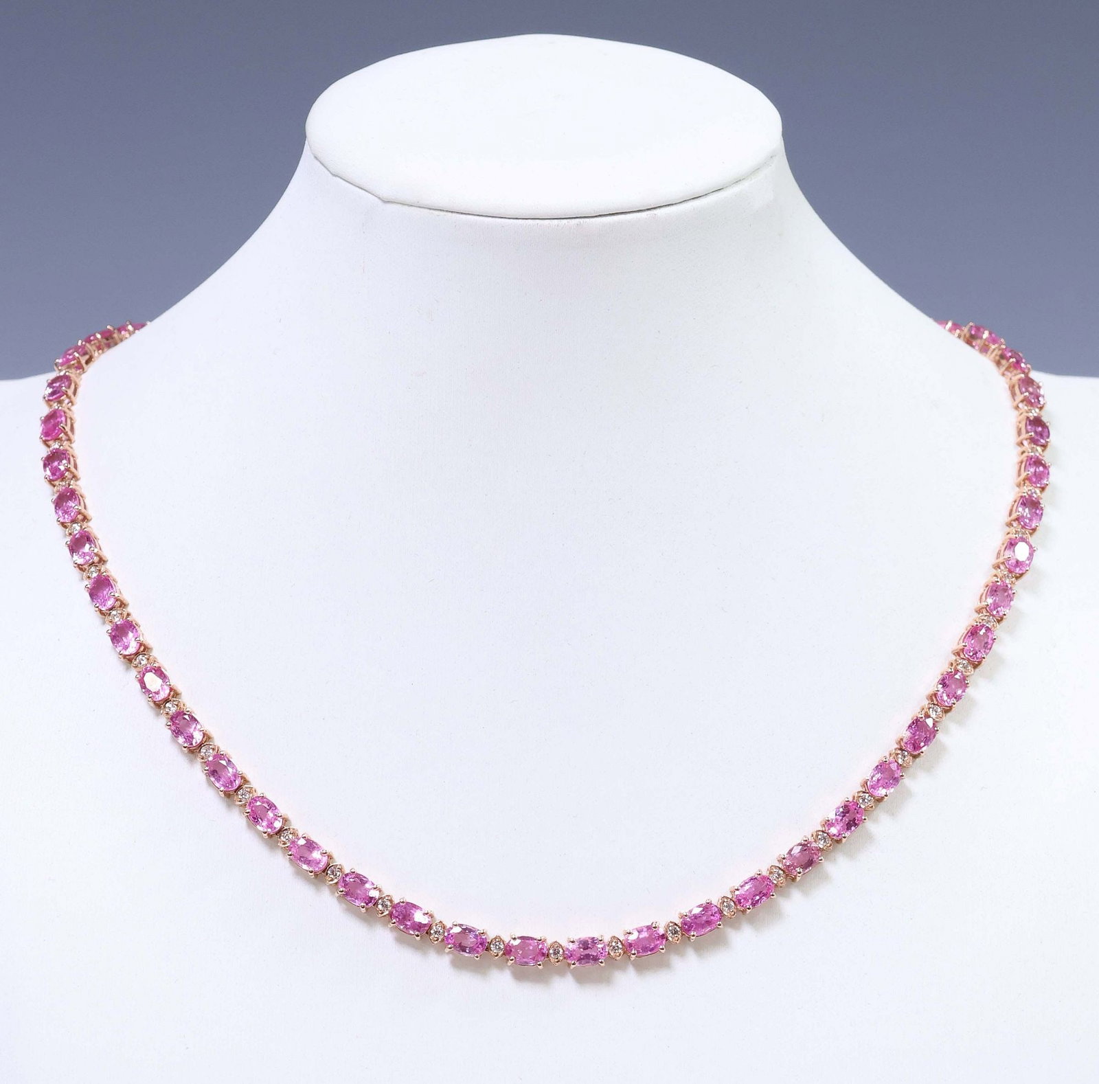 ESTATE 14KT ROSE GOLD, PINK SAPPHIRE & DIAMOND NECKLACE: Estate 14kt rose gold (tested) and gemstone necklace, comprising numerous pink sapphires, approx 31.80cttw, alternating round-cut diamonds, approx 1.00cttw, average color: H-I , average clarity: SI,