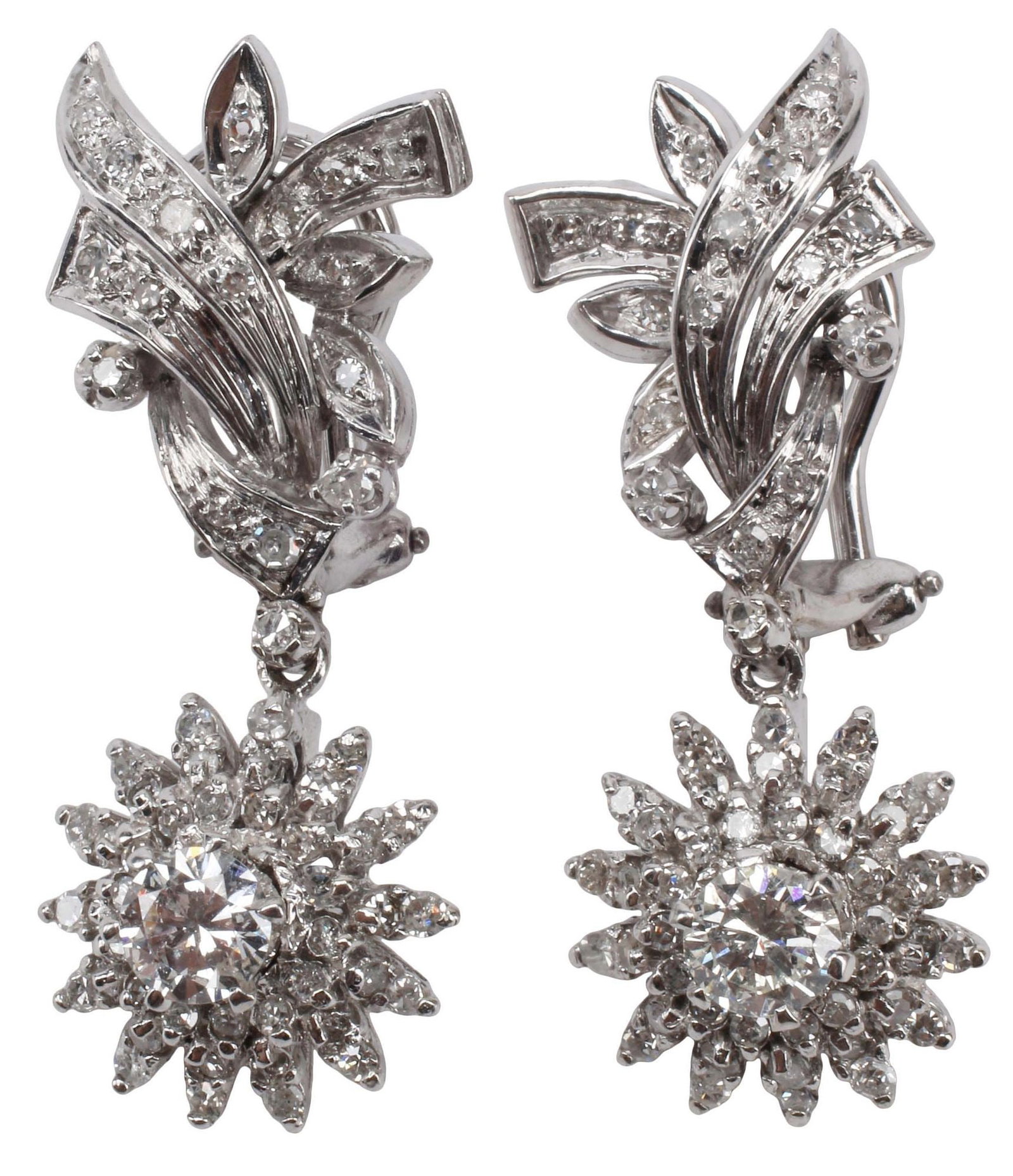ESTATE PLATINUM, WHITE GOLD & 3.25CTTW DIAMOND FLORIFORM EARRINGS: Estate platinum and 18kt white gold (tested) drop earrings, each with platinum foliate surmount and 18kt white gold floriform drop, centering a round-cut diamond, approx 1.00cttw, average color: H-I,