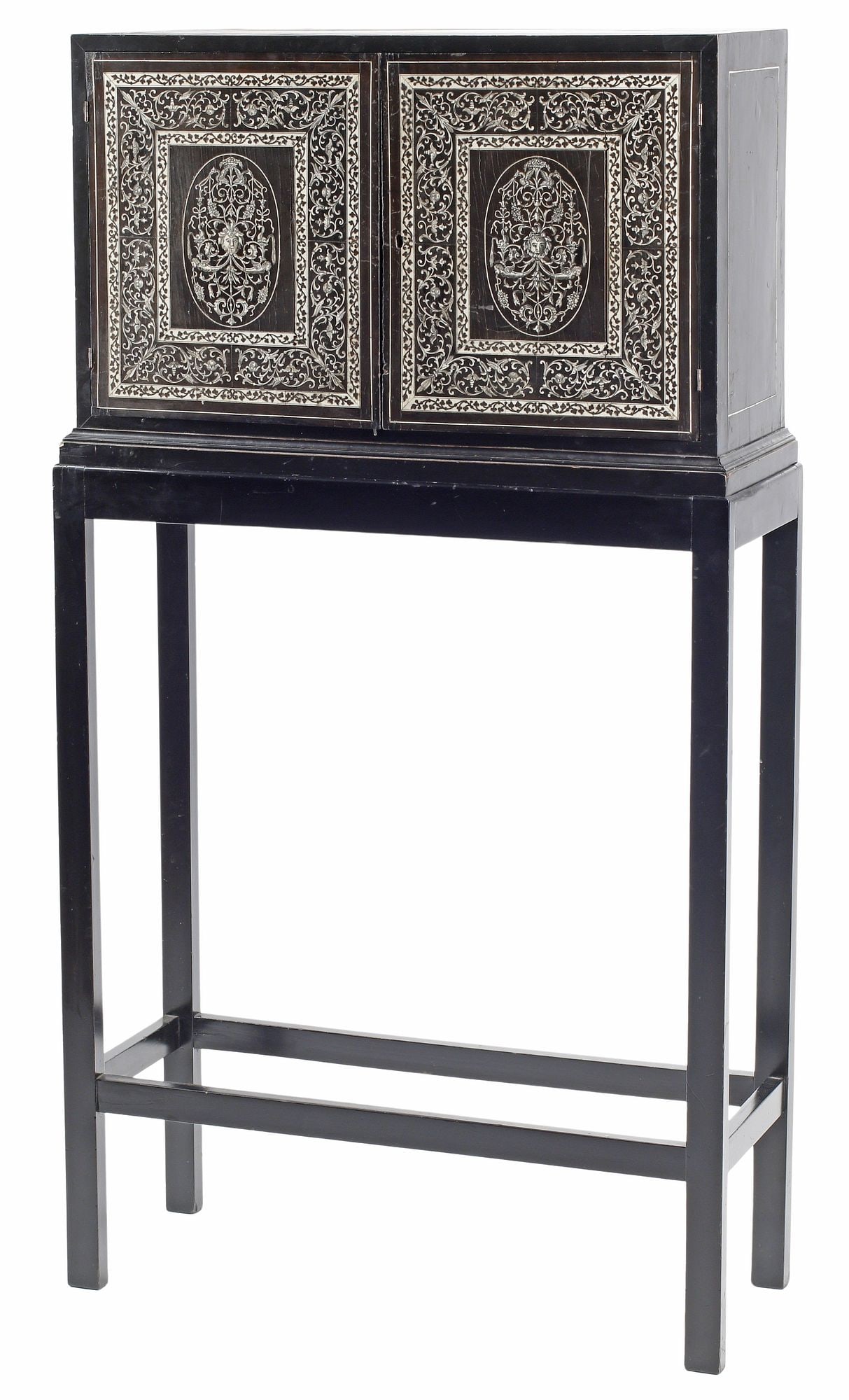 ITALIAN EBONIZED & FINELY-INLAID CABINET ON LATER STAND: Italian ebonized and inlaid cabinet, 19th c., dual cabinet doors with ornate scrolled foliate inlay centering mask, opening to fitted interior with central panel depicting Classical style figure