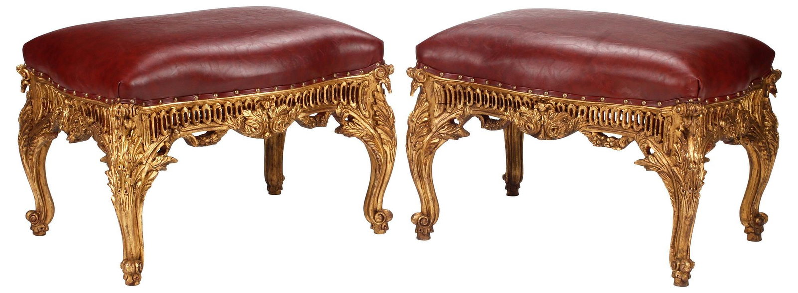 (2) ROCOCO STYLE UPHOLSTERED GILT BENCHES / FOOTSTOOLS: (pair) Rococo style parcel-gilt benches or stools, each having padded top in dark red leather upholstery, with nailhead trim, rising on cabriole legs, ending on whorl feet, approx 21"h, 29"w, 22"d
