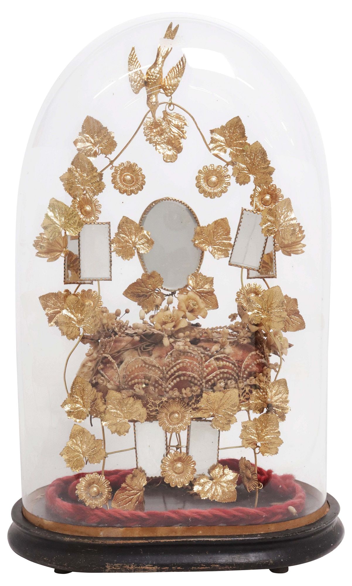 FRENCH GLOBE DE MARIEE / BRIDE'S GLOBE IN GLASS CLOCHE: French globe de mariee/ bride's globe, late 19th c., glass cloche/ dome on ebonized base, enclosing gilt metal frame, with flowers and small mirror plates on tufted cushion, approx 21"h, 13"w, 9.5"d,
