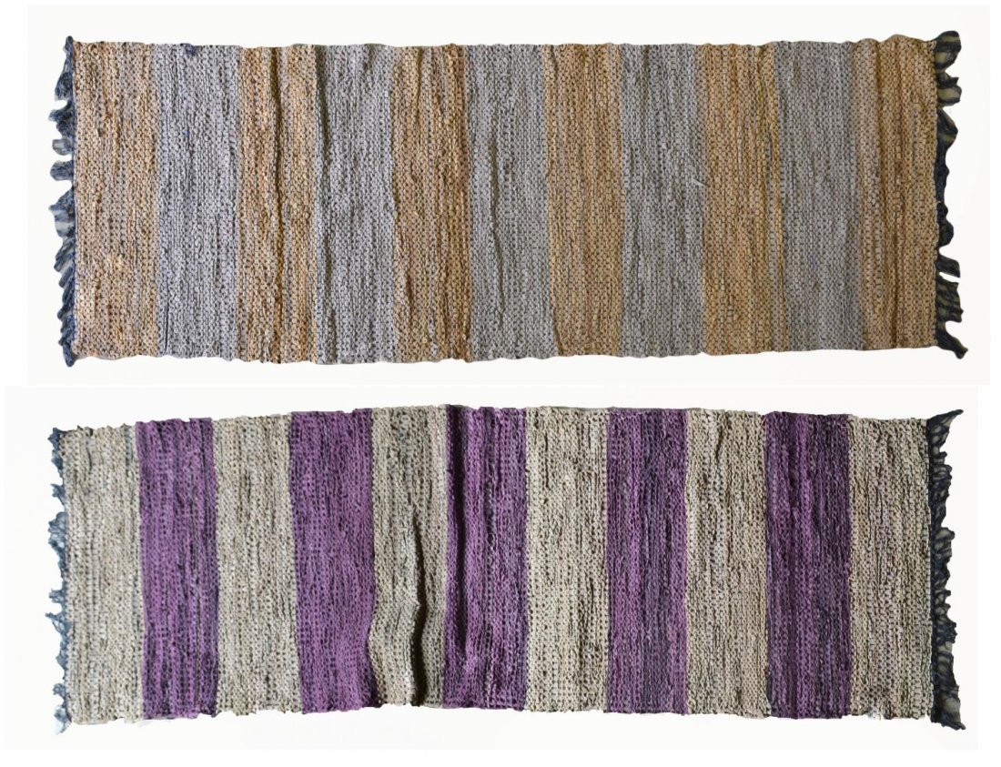 (2) LEATHER RAG RUG RUNNERS: (lot of 2) Leather rag rug runners, one with alternating tones of oranges and greys, the other purples and tans, largest: 6'11.5"l, 2'4.5"w (inclusive of fringe), 10.25lbs Start Price: $80