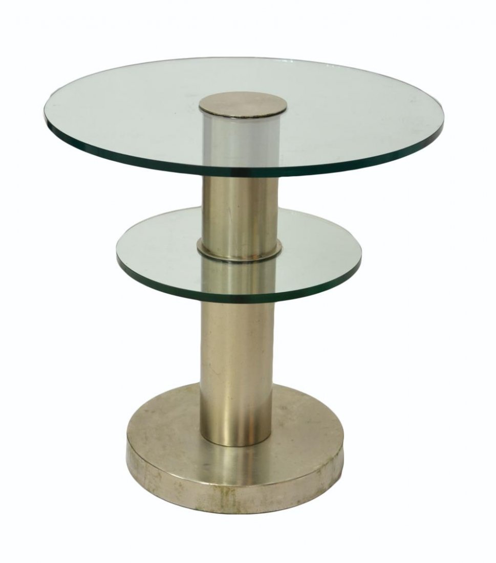 'TAVOLINO' TABLE, GIO PONTI FOR FONTANA ARTE: Italian 'Tavolino' table, design by Gio Ponti (Milan, 1891-1979), for Fontana Arte, c. 1980, two thick float-glass disks on a cylindrical polished nickel-plated brass standard, 24”h, 24”diam Start