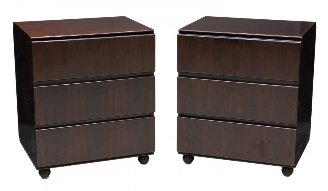 ITALIAN ROSEWOOD CHESTS, CLAUDIO SALOCCHI: (pair) Italian modern rosewood chests, Claudio Salocchi (Italian, b. 1934) for Sormani, Italy, c. 1970, rectangular, each with three drawers, rising on ball feet, 27.75"h, 23.75"w, 19.5"d Start Price: