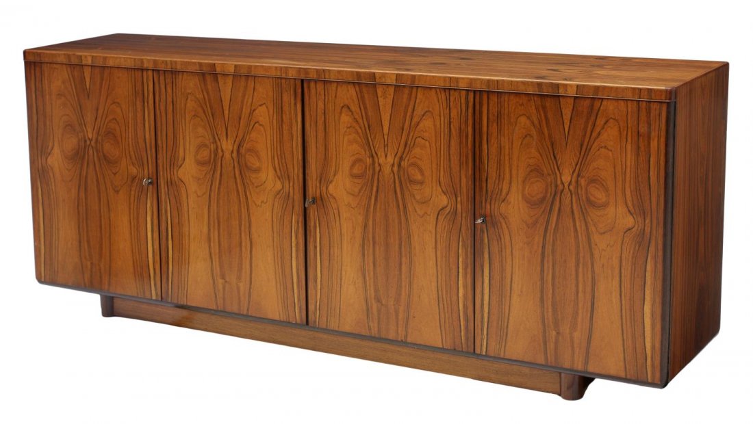 DANISH MID-CENTURY MODERN ROSEWOOD SIDEBOARD: Danish modern mid-century rosewood sideboard, c. 1960, rectangular with four doors, the two end doors opening to trays and silver drawers, 31.25"h, 77"w, 16.5"d Start Price: $600.00